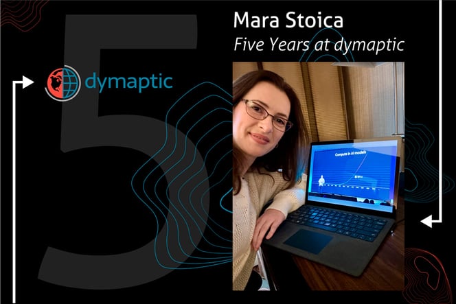 Dymaptic CEO Mara Stoica smiling with a laptop